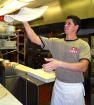 Catching Steve in the act showing off his pizza-making skills for the customers.
(photo courtesy of the Hunterdon County Democrat)