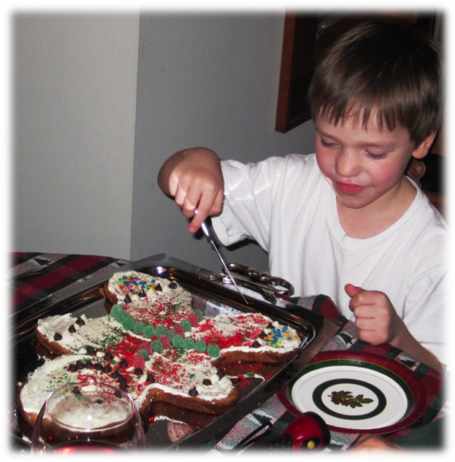 Our Ukrainian Adopted Son Enjoying Christmas Preperations Our Adopted Ukrainian Angel: Alex with Christmas Cookie